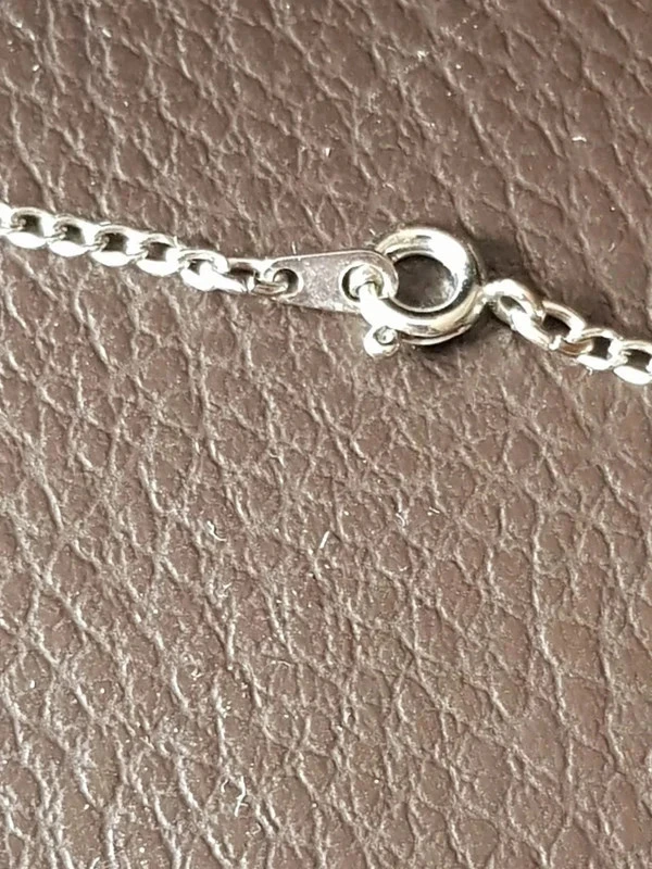 Colar e pingente prateado com pedra azul e strass novo – photo 4